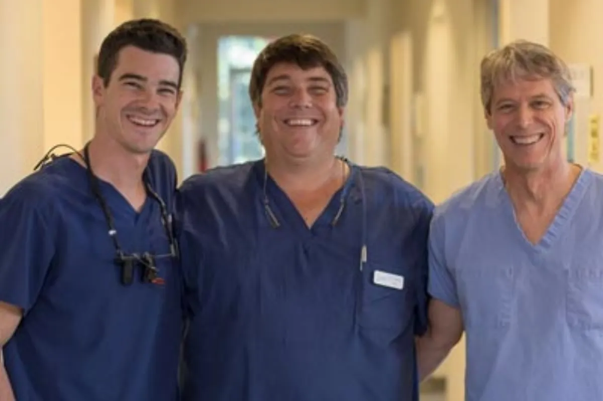 Atlantic Dental Group team with a patient